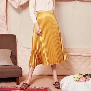 Glossy satin pressed Golden shining pleated skirt